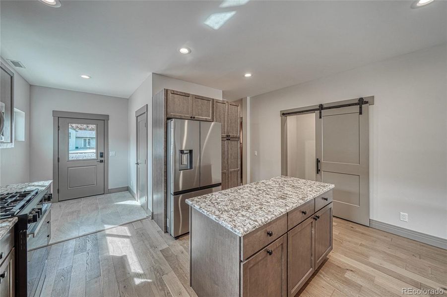Truly a must see and feel kitchen, with pull out drawers in the pantry.