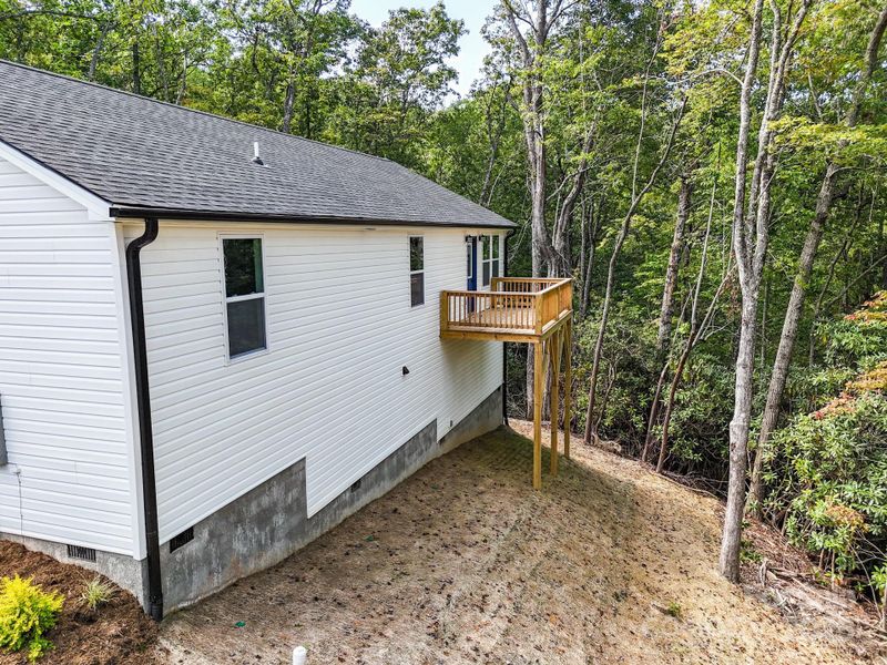 Front exterior of a new home in , Etowah, NC, highlighting curb appeal (Image 23). Front exterior of a new home in , Etowah, NC, highlighting curb appeal (Image 23).