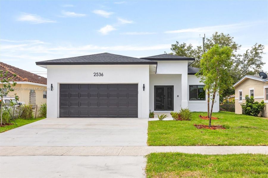 Front exterior of a new home in , Fort Lauderdale, FL, highlighting curb appeal (Image 13). Front exterior of a new home in , Fort Lauderdale, FL, highlighting curb appeal (Image 13).