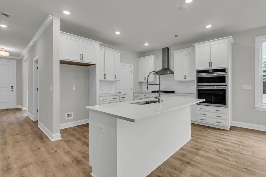 Furnished interior view inside a new home in Tidewater at Lakes of Cane Bay, Summerville (Image 4).
