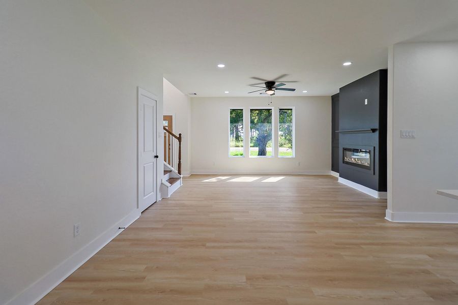 The large window allows for natural light to fill this beautiful room.