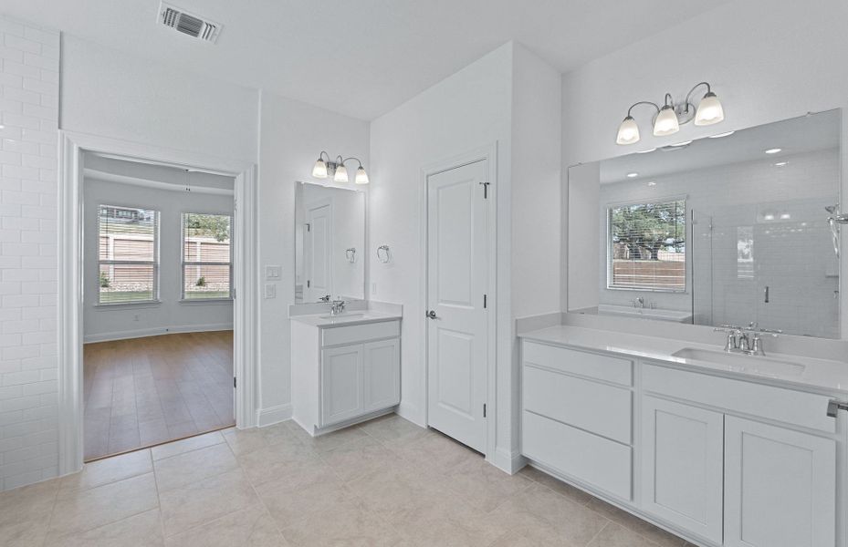 Furnished interior view inside a new home in Bluffview Reserve, Leander (Image 6).