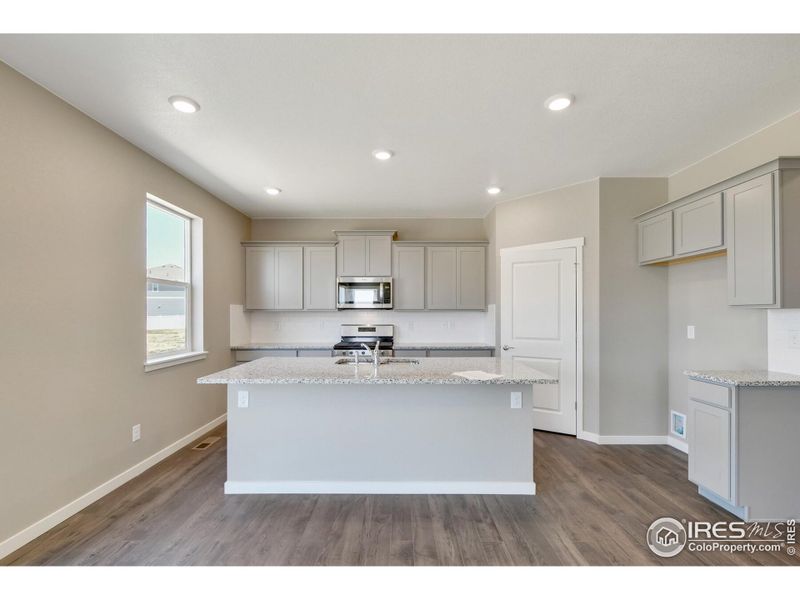 Furnished interior view inside a new home in Settlers Crossing, Commerce City (Image 6).
