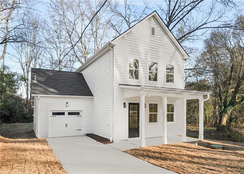 Front exterior of a new home in , Atlanta, GA, highlighting curb appeal (Image 1). Front exterior of a new home in , Atlanta, GA, highlighting curb appeal (Image 1).