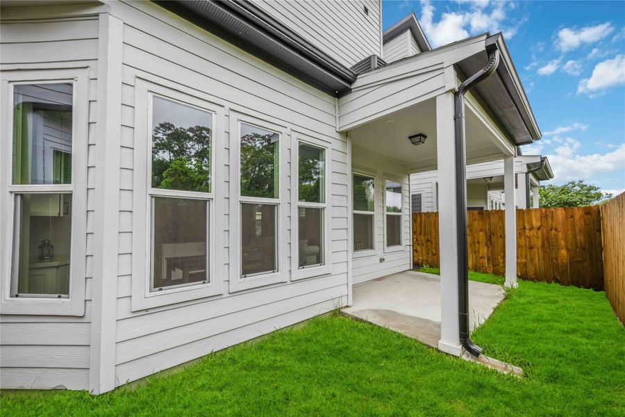 Exterior details and patio area of a home in , Houston (Image 3). Exterior details and patio area of a home in , Houston (Image 3).