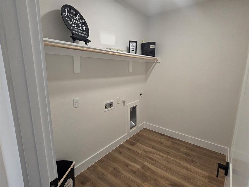 Laundry room featuring gas dryer hookup, electric dryer hookup, dark wood-style floors, and hookup for a washing machine