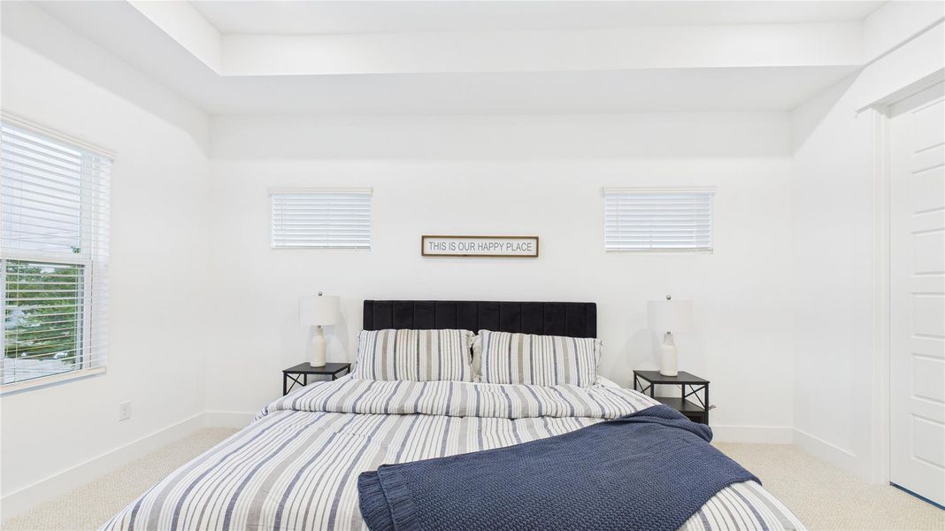 This spacious primary bedroom offers a serene retreat with ample natural light and a well-designed layout. Featuring generous proportions, elegant finishes, and a comfortable atmosphere, it provides a private oasis within the home. Its elevated position enhances privacy while creating a quiet, peaceful ambiance—ideal for relaxation This spacious primary bedroom offers a serene retreat with ample natural light and a well-designed layout. Featuring generous proportions, elegant finishes, and a comfortable atmosphere, it provides a private oasis within the home. Its elevated position enhances privacy while creating a quiet, peaceful ambiance—ideal for relaxation