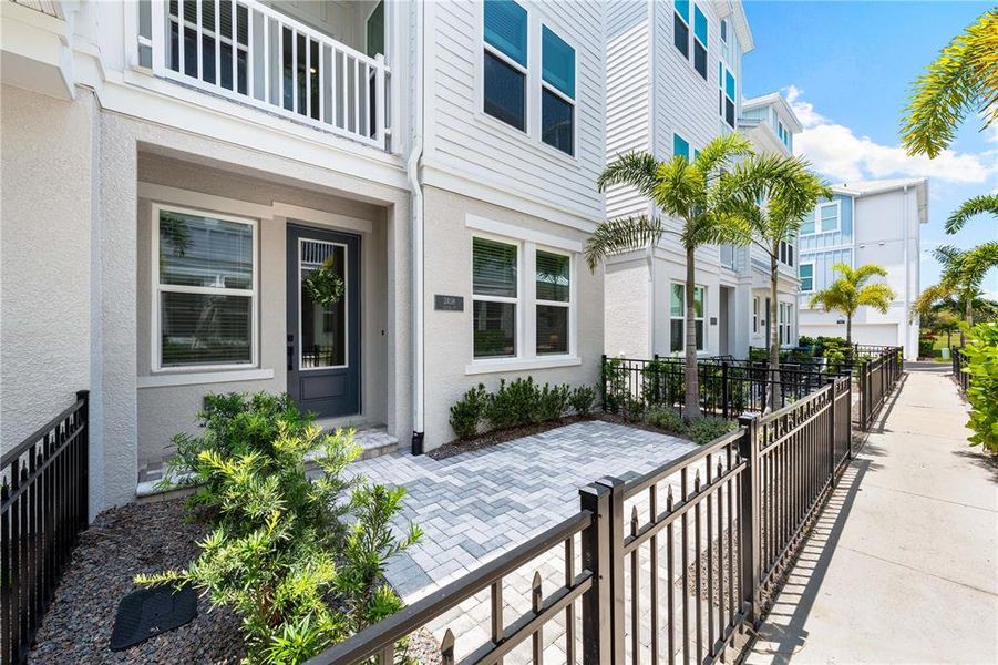 Front exterior of a new home in , Sarasota, FL, highlighting curb appeal (Image 27).