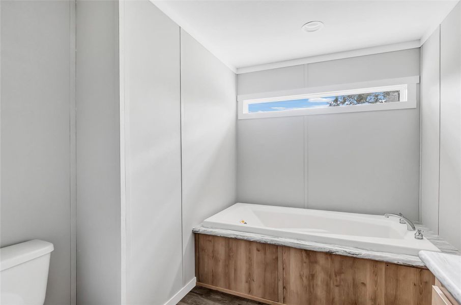 Primary bathroom with separate shower and tub