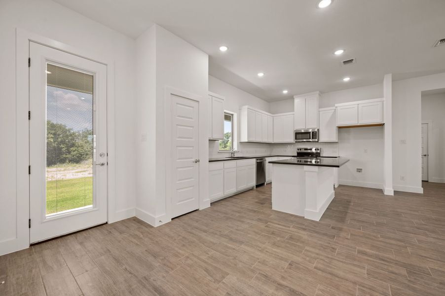 Furnished interior view inside a new home in Saddleback Estates, Boyd (Image 4).