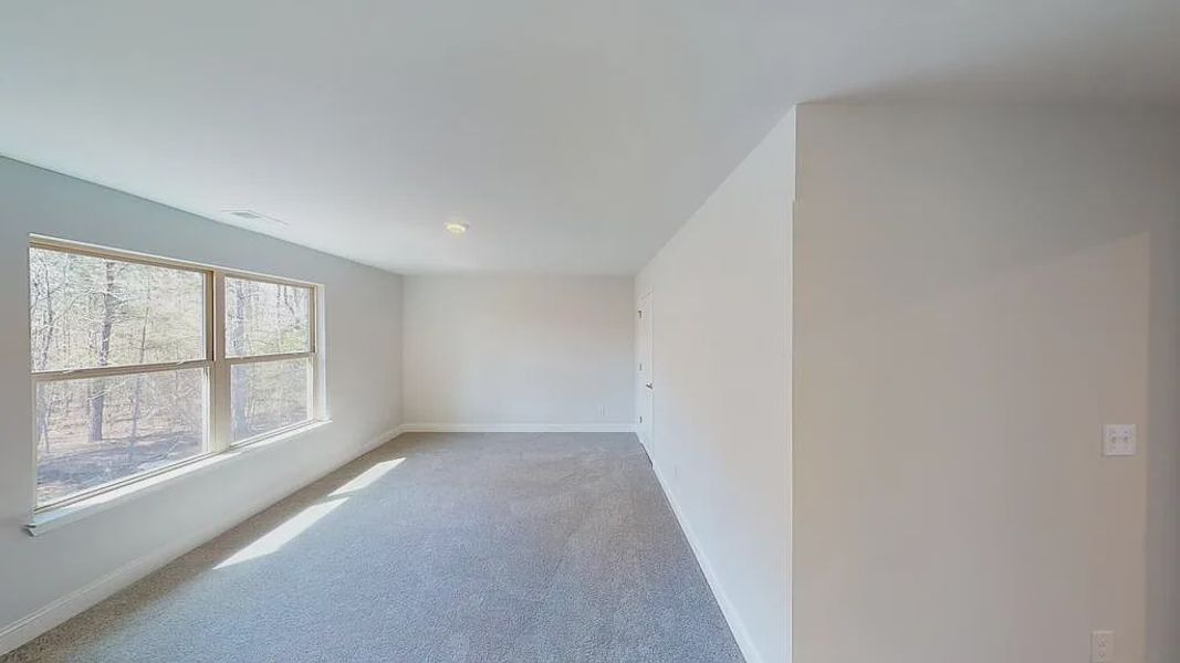 Spacious, unfurnished interior of a new home in Mirror Lake at South Harbour, Villa Rica (Image 11).