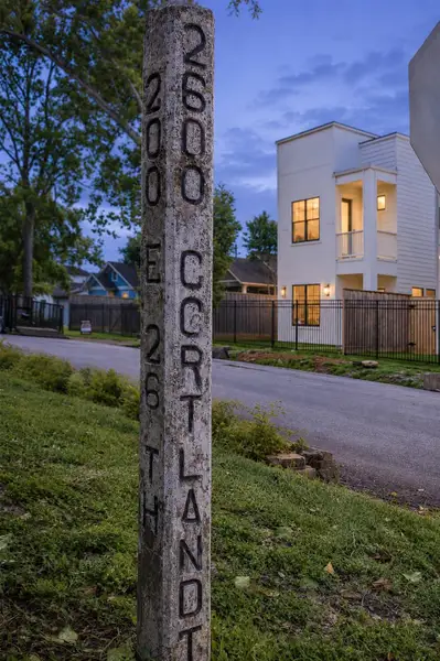 A surviving concrete street marker stands along Cortlandt Street, quietly tying the block back to the early history of the Houston Heights. Set against the backdrop of newer construction and mature trees, it captures the contrast that continues to define the neighborhood today, where historic character and modern development exist side by side. A surviving concrete street marker stands along Cortlandt Street, quietly tying the block back to the early history of the Houston Heights. Set against the backdrop of newer construction and mature trees, it captures the contrast that continues to define the neighborhood today, where historic character and modern development exist side by side.