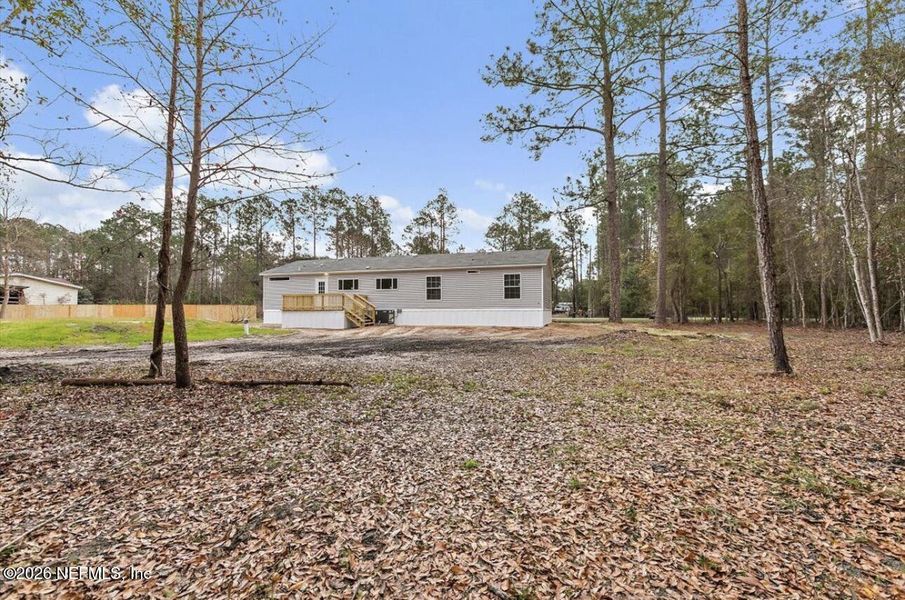 Exterior details and patio area of a home in , Jacksonville (Image 22). Exterior details and patio area of a home in , Jacksonville (Image 22).