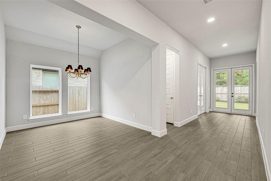 Formal dining room conveniently located next to the kitchen for an open floorplan feel Formal dining room conveniently located next to the kitchen for an open floorplan feel