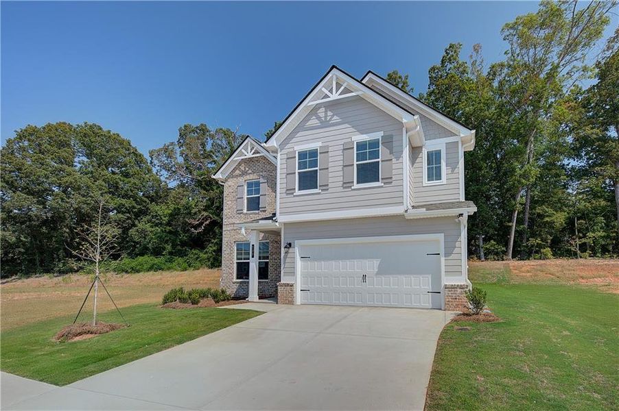 Front exterior of a new home in Westminster, Covington, GA, highlighting curb appeal (Image 15).
