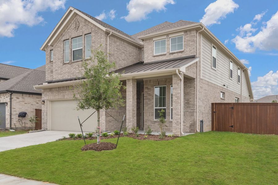 Representative exterior photo of a completed home built from the Viola by Chesmar Homes in Brookewater 45's, Rosenberg, TX (Image 16).