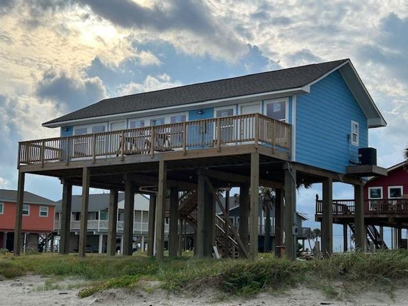 Front exterior of a new home in , Galveston, TX, highlighting curb appeal (Image 11). Front exterior of a new home in , Galveston, TX, highlighting curb appeal (Image 11).