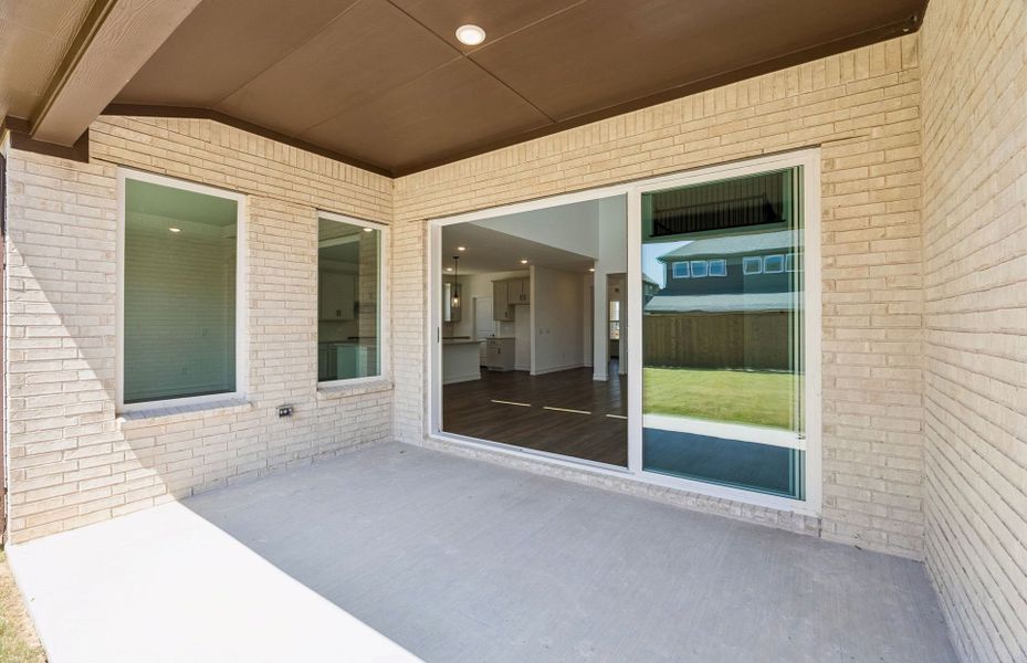 Exterior details and patio area of a home in Highland Lakes, McKinney (Image 3).