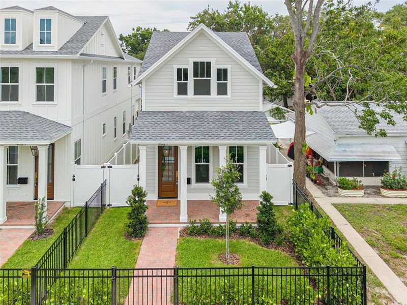 Front exterior of a new home in , St. Petersburg, FL, highlighting curb appeal (Image 25).