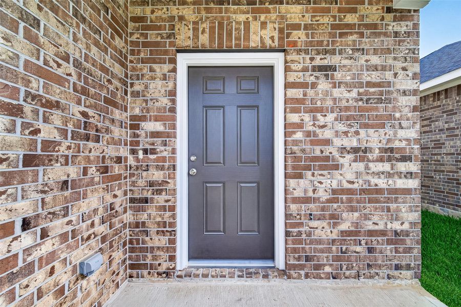 Exterior details and patio area of a home in Mill Creek Trails, Magnolia (Image 3).