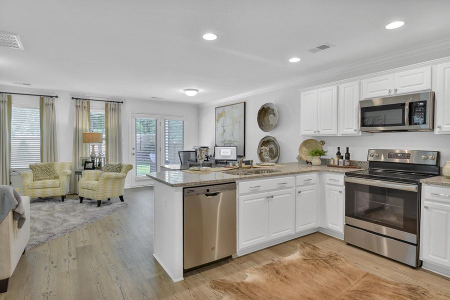 Furnished interior view inside a new home in Central Creek, Goose Creek (Image 4).
