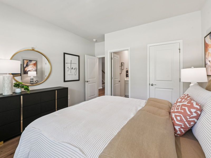 Secondary bedroom in the Taylorsville floorplan at a Meritage Homes community in Mebane, NC. Secondary bedroom in the Taylorsville floorplan at a Meritage Homes community in Mebane, NC.