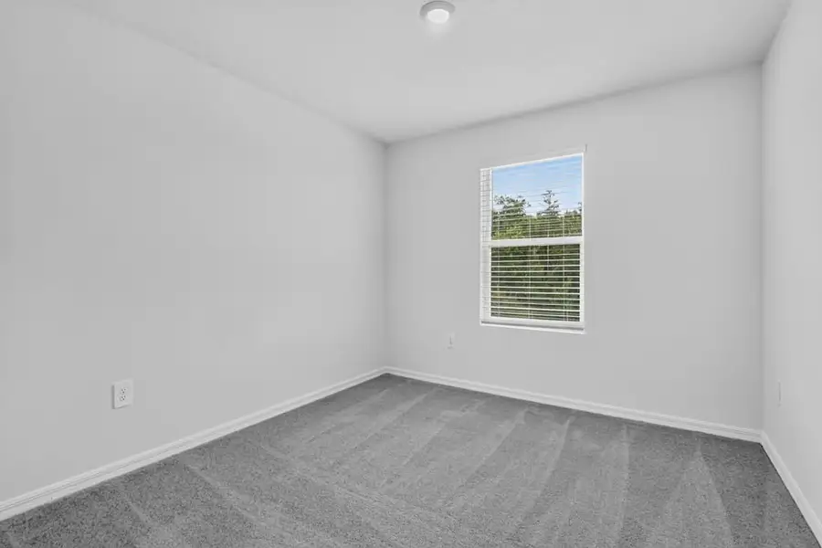 Representative unfurnished interior of a home built from the Kingfisher by Taylor Morrison in Palm Wind, Hudson (Image 18).