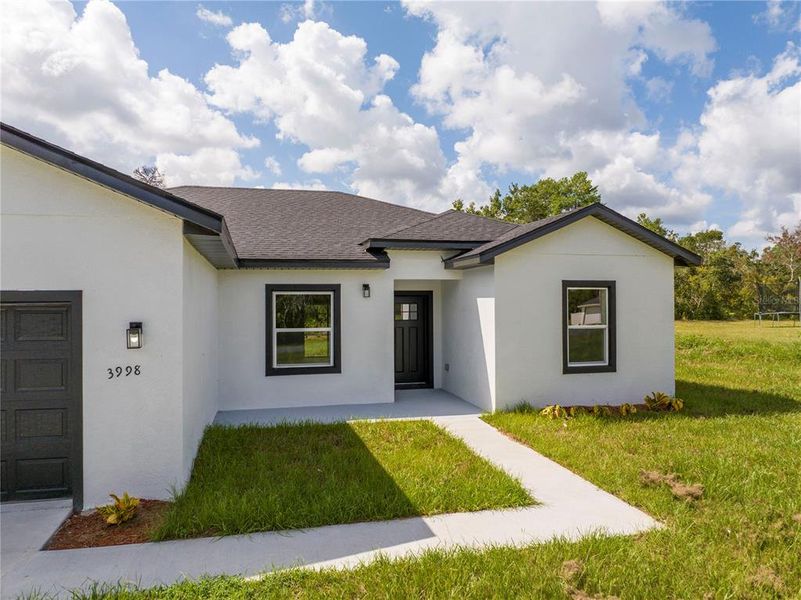 Exterior details and patio area of a home in , Ocala (Image 41).