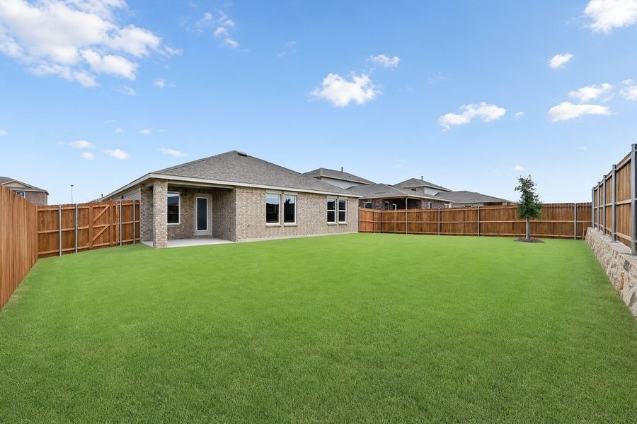 Exterior details and patio area of a home in Parks at Foster Crossing, Anna (Image 4).