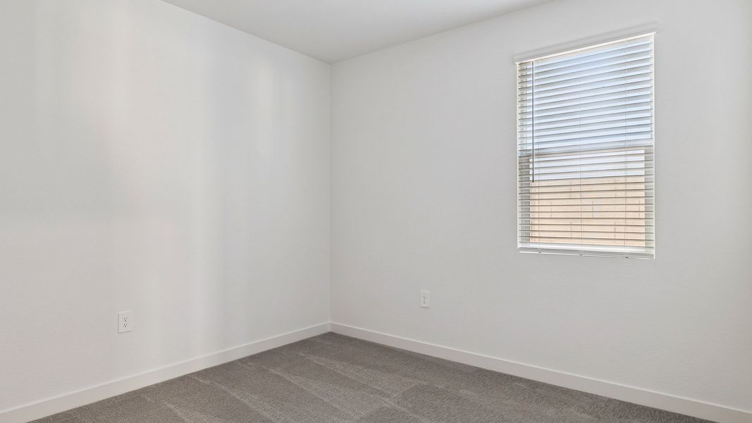 Representative unfurnished interior of a home built from the Hayden by D.R. Horton in The Ridge at Stone Butte, Phoenix (Image 28).