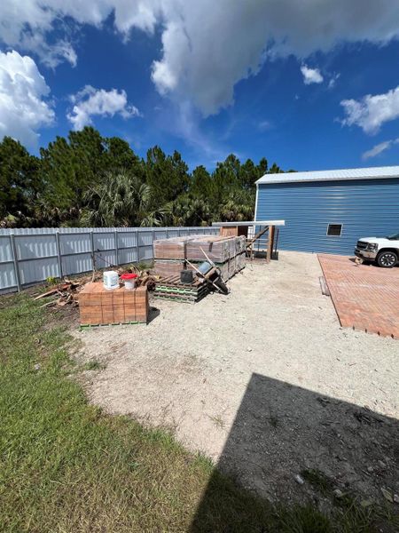 Front exterior of a new home in , Palm Bay, FL, highlighting curb appeal (Image 28).