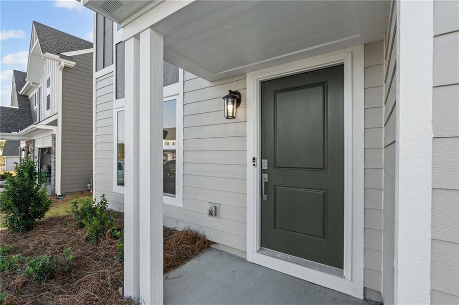 Exterior details and patio area of a home in Twin Lakes, Hoschton (Image 3). Exterior details and patio area of a home in Twin Lakes, Hoschton (Image 3).