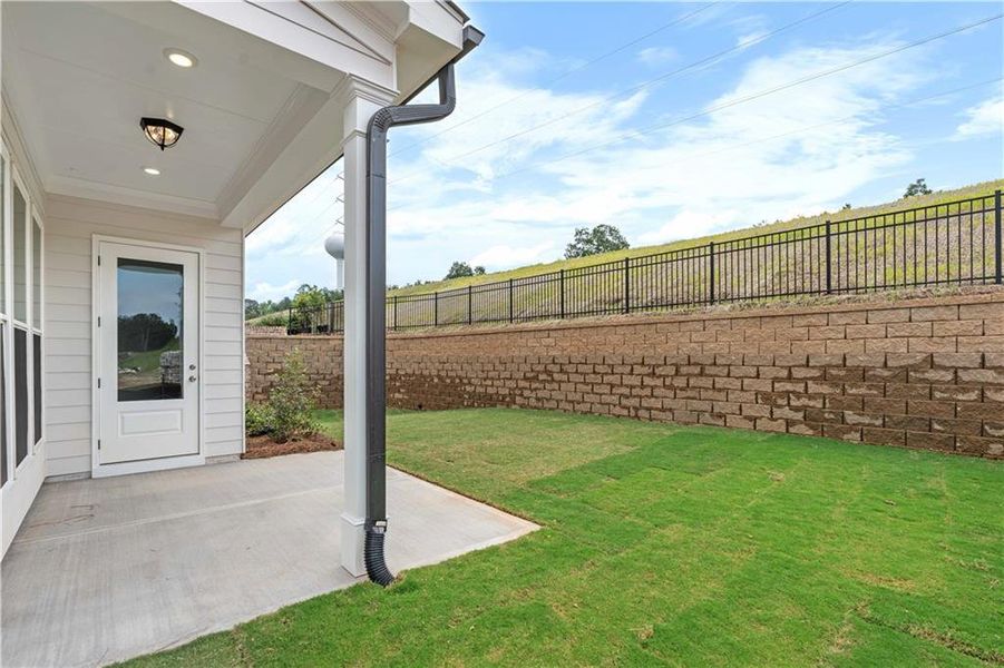 Exterior details and patio area of a home in Palisades Single Family, Cumming (Image 16). Exterior details and patio area of a home in Palisades Single Family, Cumming (Image 16).
