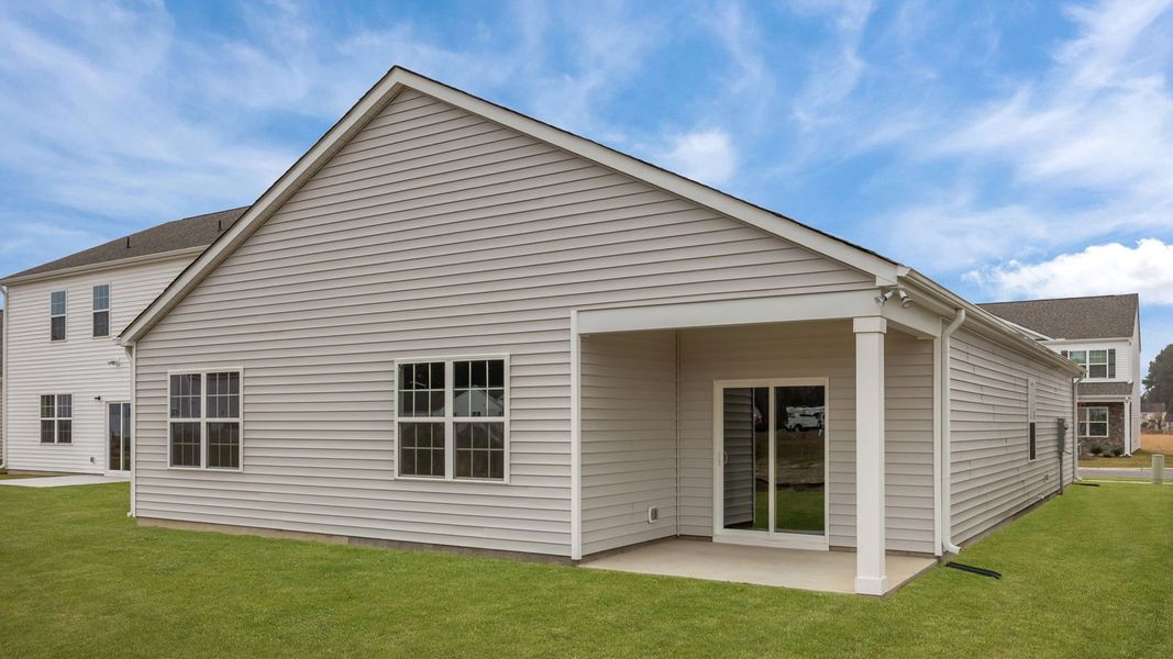 Exterior details and patio area of a home in Ridgewood Farms, Winterville (Image 22).