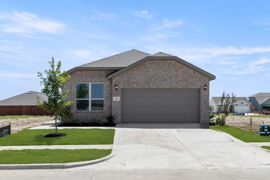 Front exterior of a new home in Northspur, Terrell, TX, highlighting curb appeal (Image 19). Front exterior of a new home in Northspur, Terrell, TX, highlighting curb appeal (Image 19).