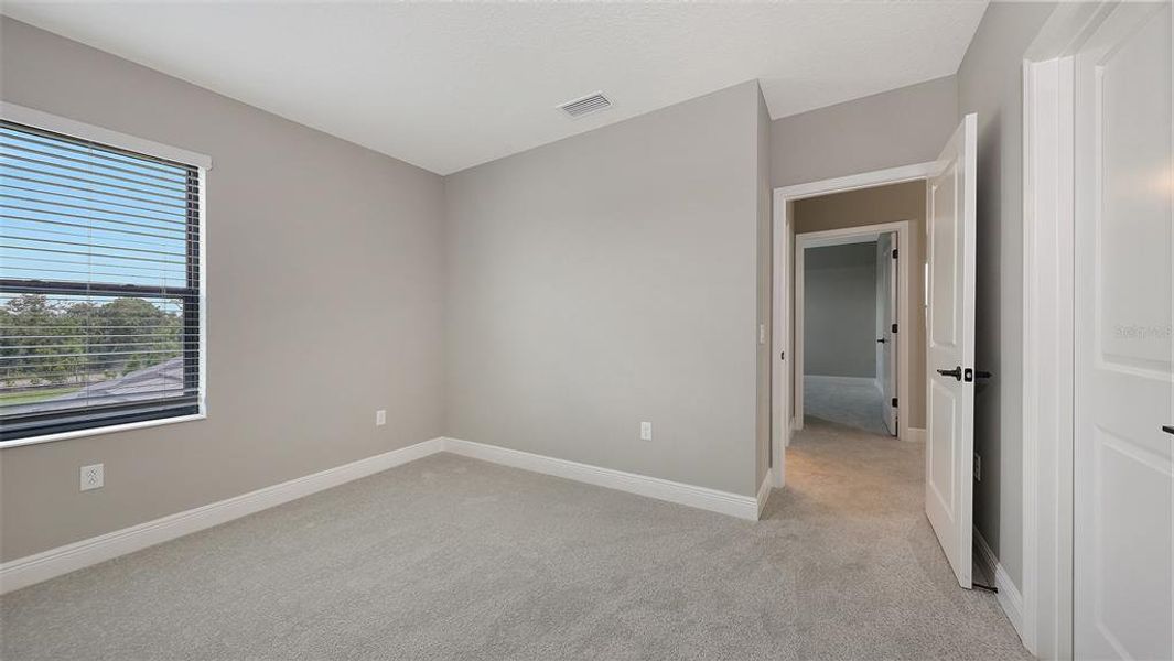 Spacious, unfurnished interior of a new home in Palm Grove, Lakewood Ranch (Image 28).