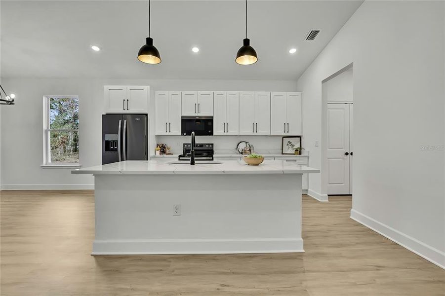 Furnished interior view inside a new home in , Weeki Wachee (Image 6).