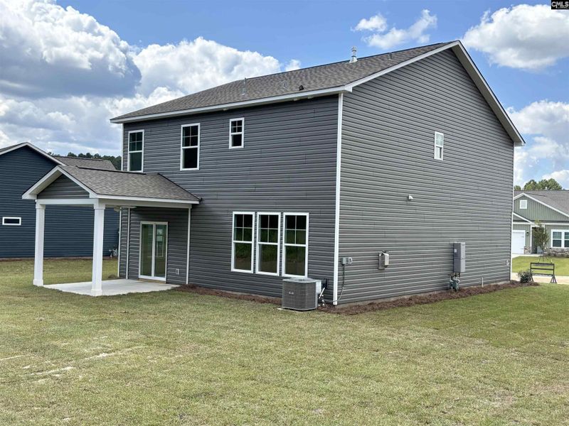 Front exterior of a new home in Rolling Hills, Prosperity, SC, highlighting curb appeal (Image 21).