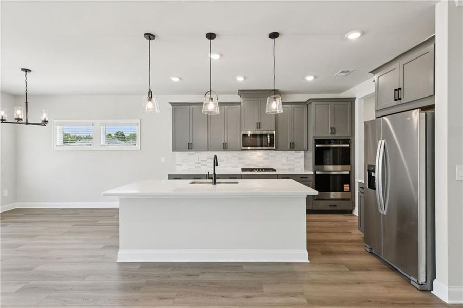 Furnished interior view inside a new home in Vines at Mill Creek - Estate Series, Braselton (Image 10).
