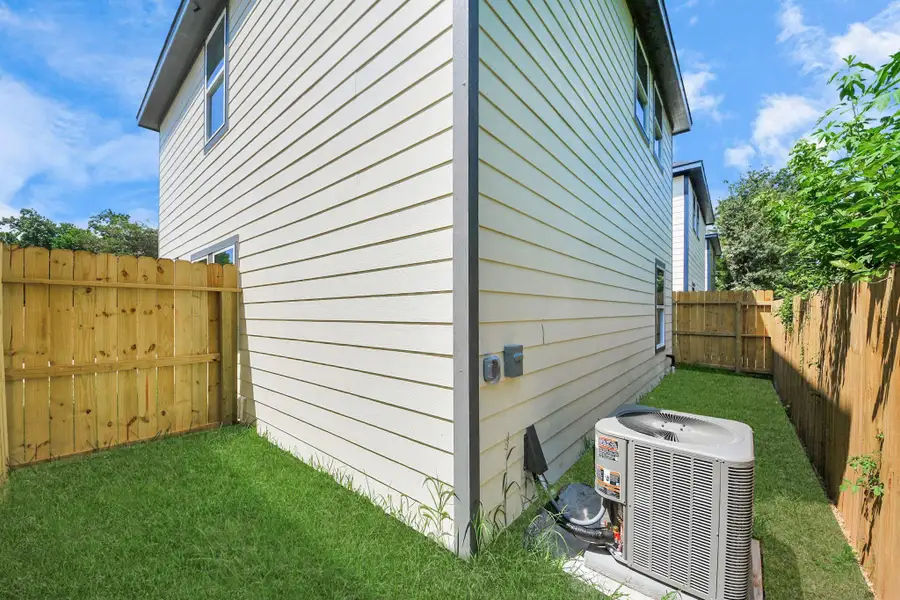 Front exterior of a new home in , Houston, TX, highlighting curb appeal (Image 1).