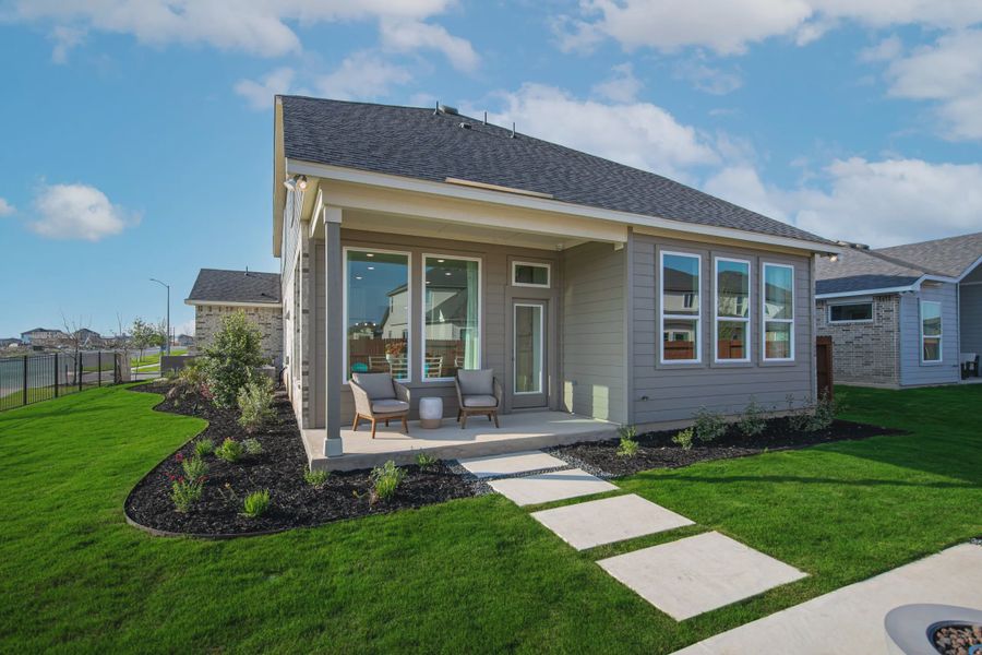 Exterior details and patio area of a home in Stillwater Ranch, Buda (Image 3).
