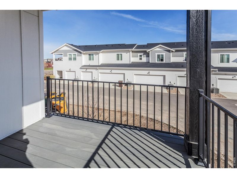 Exterior details and patio area of a home in Raindance Condos, Windsor (Image 20).