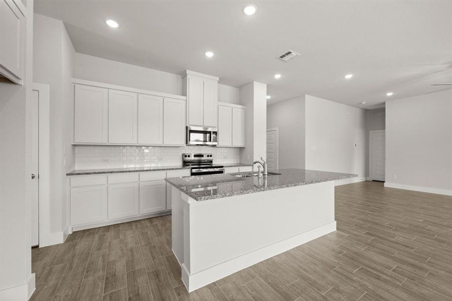 Furnished interior view inside a new home in Saddleback Estates, Boyd (Image 14).