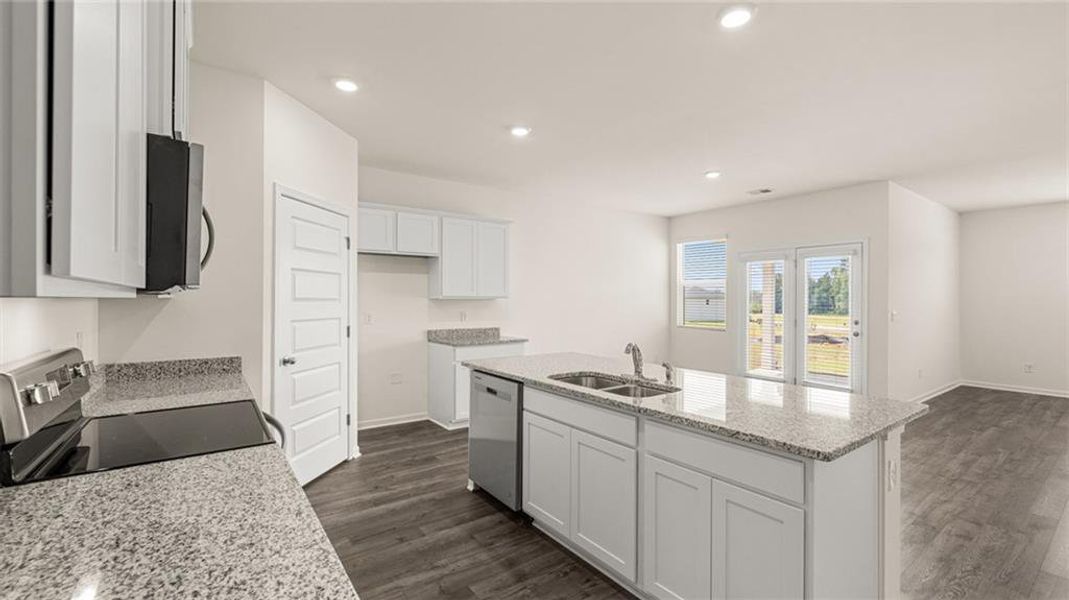 Furnished interior view inside a new home in Oakchase at Hampton, Hampton (Image 9).