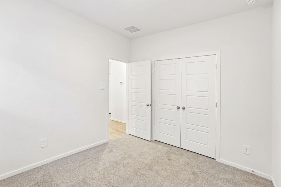 Spacious, unfurnished interior of a new home in Riviera Pines - Traditional Series, Conroe (Image 27).