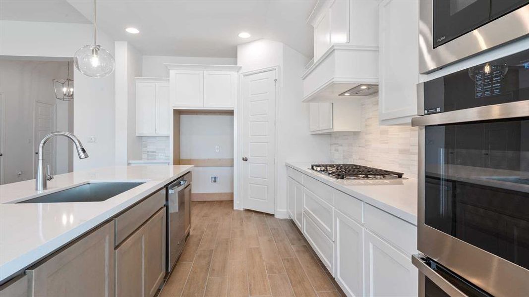 Furnished interior view inside a new home in The Heights At Uptown Celina 50', Celina (Image 7).