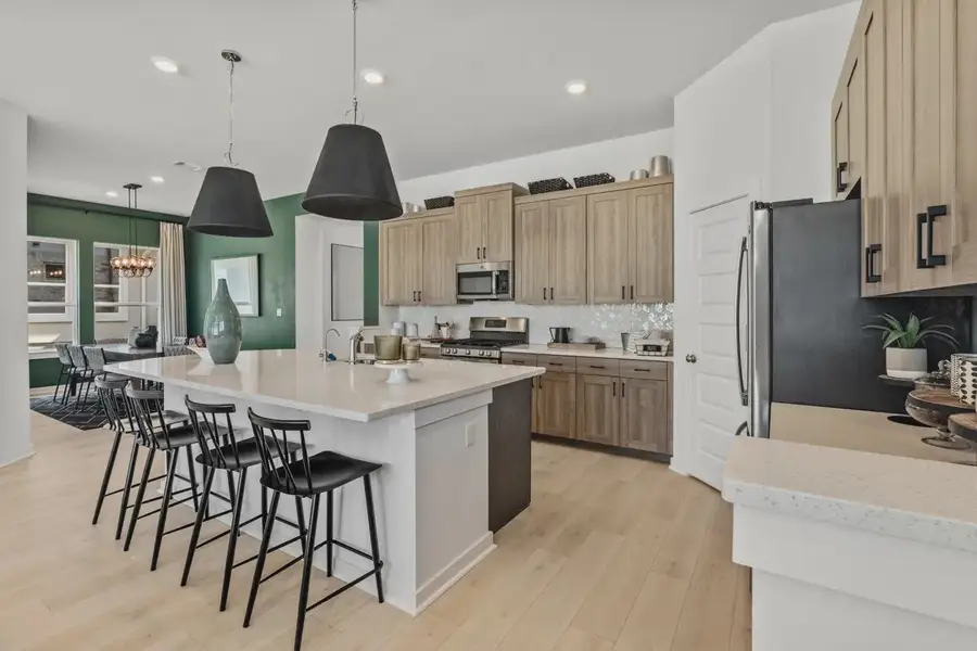 Representative furnished interior of a home built from the Peyton by Chesmar Homes in Highland Village, Georgetown (Image 4).