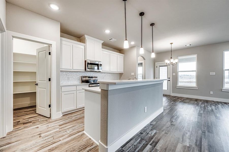 kitchen with view of pantry