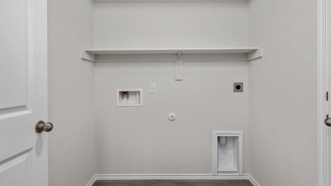 Laundry area featuring hookup for a gas dryer, hookup for a washing machine, hookup for an electric dryer, and dark wood-style flooring