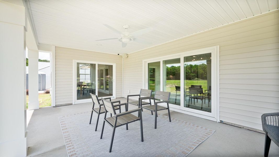 Exterior details and patio area of a home in Creekside at Andrews, Summerville (Image 23).